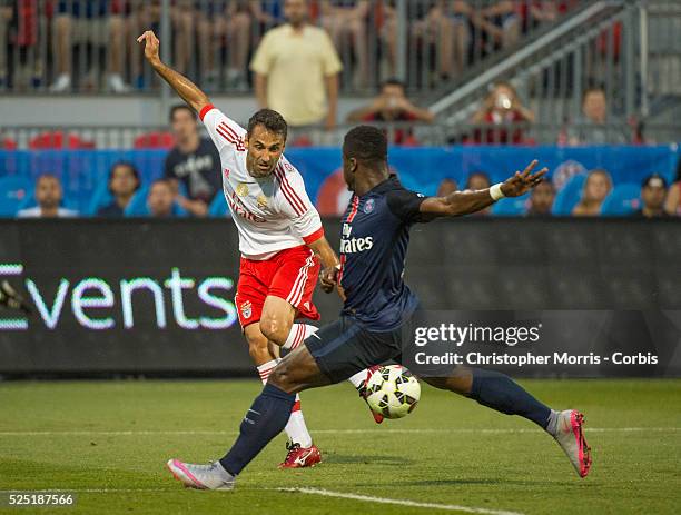 Paris St. Germain's Jonas and SL Benfica's Serge Aurier in the International Champions Cup in Toronto.