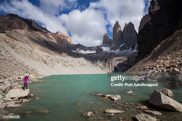 photographing mirador torres and reflection - puerto natales stock pictures, royalty-free photos & images