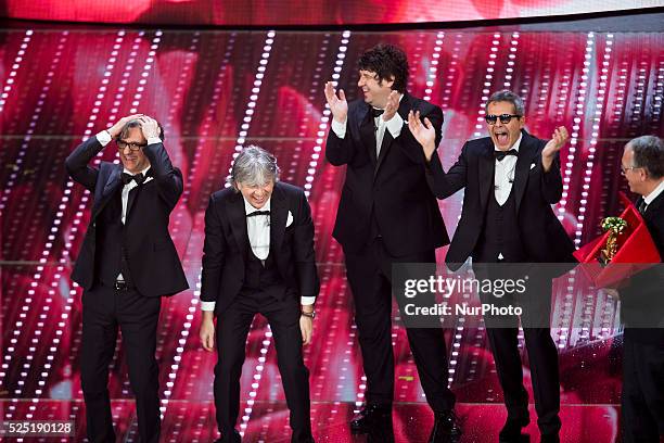 Italian Band Stadio, winners of the 66th Italian Music Festival in Sanremo, celebrate at the Ariston theatre during the closing night on February 13,...