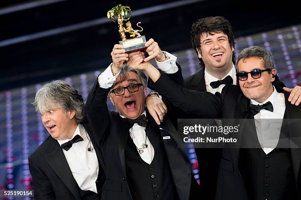 Italian Band Stadio, winners of the 66th Italian Music Festival in Sanremo, pose with the award at the Ariston theatre during the closing night on...