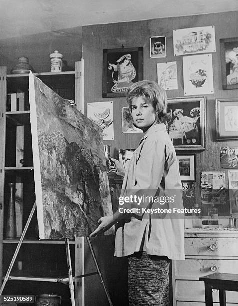 Cayetana Fitz-James Stuart , 18th Duchess of Alba, working on one of her paintings at the Liria Palace, Madrid, 16th June 1961.