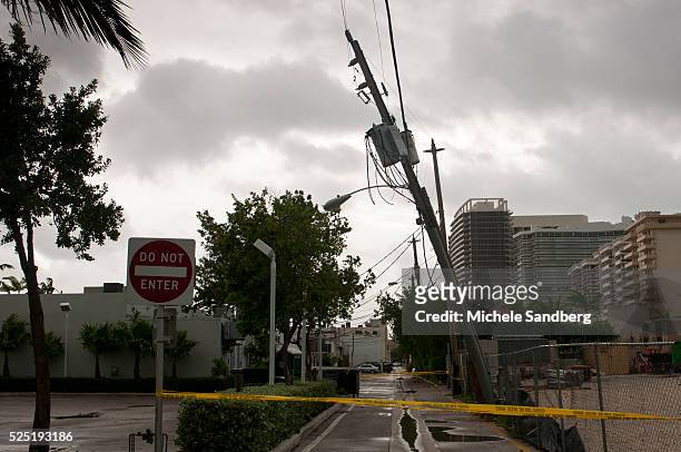 August 26, 2012 Heavy Winds Cause Florida Power and Lighting Pole to fall down. FPL covers the electricity in South Florida