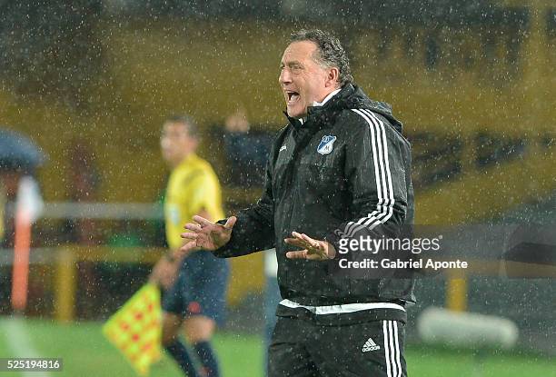 Ruben Israel coach of Millonarios shouts instructions to his players during a match between Millonarios and Junior as part of round 15 of Liga Aguila...