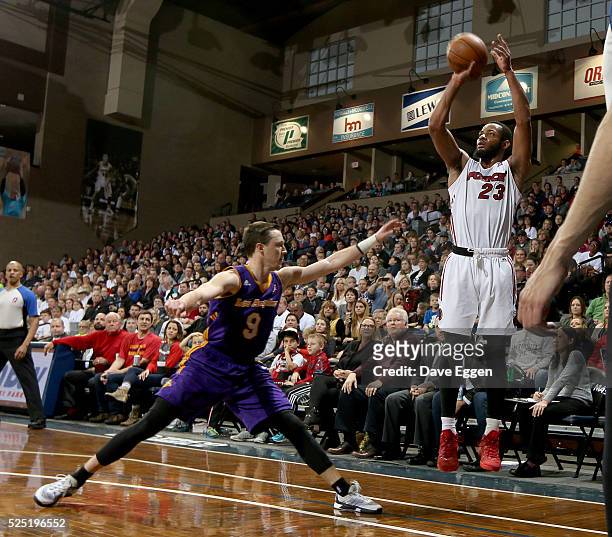 Jabril Trawick of the Sioux Falls Skyforce spots up for a jumper over Josh Magette of the Los Angeles Defenders during the NBA D-League Finals Game 3...
