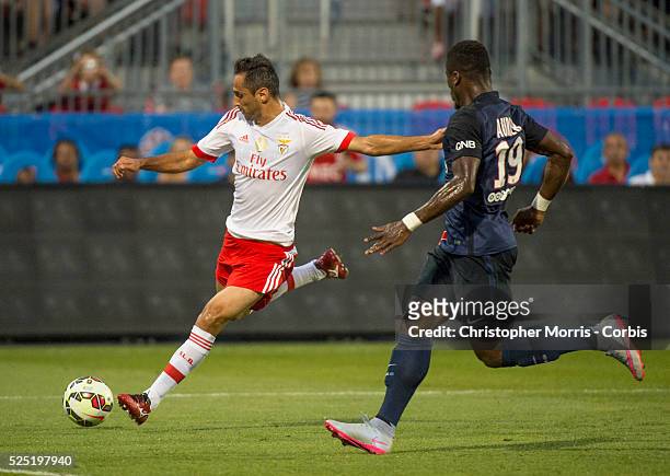 Paris St. Germain's Jonas and SL Benfica's Serge Aurier in the International Champions Cup in Toronto.