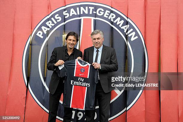 Leonardo Nascimento de Araujo general manager and Carlo Ancelotti, new head coach of Paris Saint Germain FC pose during the press conference at Parc...