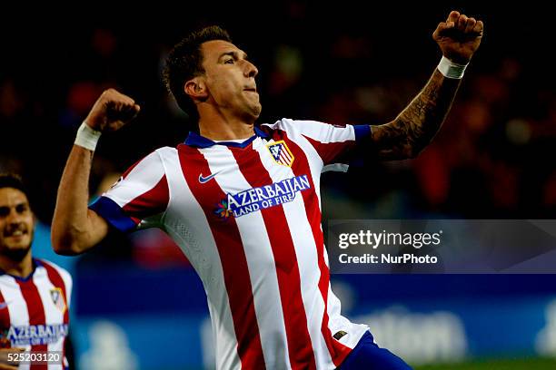 Atletico de Madrid's Croatian forward Mario Mandzukic Celebrates a goal during the Champions League 2014/15 match between Atletico de Madrid and...