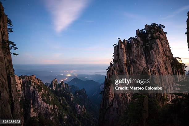 sunrise over scenic huangshan mountains, china - huangshan mountains stock pictures, royalty-free photos & images