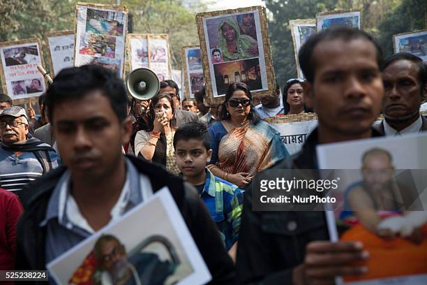 Relatives of victims of arson attack stage a protest at Central Shahid Minar in Dhaka against the blockade imposed by the BNP lead 20 party....