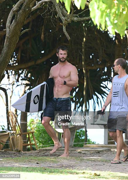 Chris Hemsworth is seen surfing and relaxing at the beach on April 28, 2016 in Byron Bay, Australia.