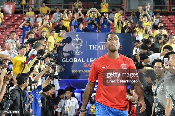 Patrick Kluivert walk out before the Global Legends Series opening match at SCG stadium in Nonthaburi, Thailand on December 5, 2014