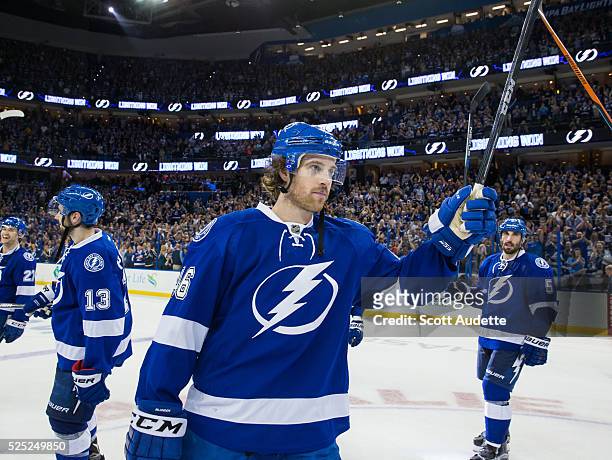 Michael Blunden of the Tampa Bay Lightning celebrates the series win against the Detroit Red Wings after Game Five of the Eastern Conference First...
