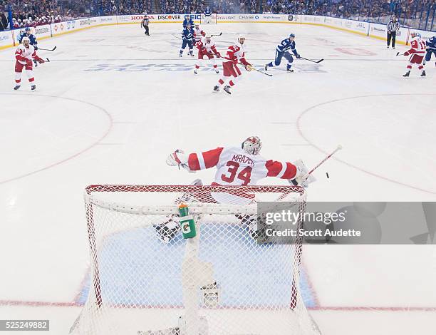 Goalie Petr Mrazek of the Detroit Red Wings makes a save against the Tampa Bay Lightning during the second period of Game Five of the Eastern...