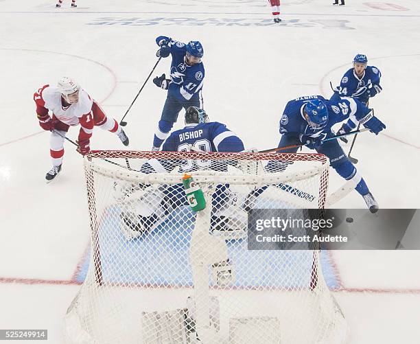 Goalie Ben Bishop of the Tampa Bay Lightning makes a save against the Detroit Red Wings during the third period of Game Five of the Eastern...