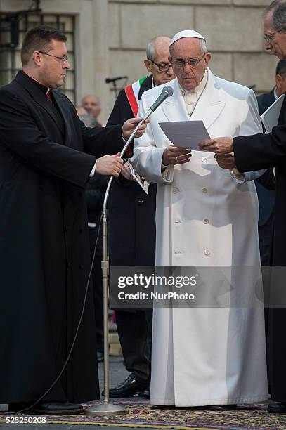 Pope Francis leads a prayer at the statue of Virgin Mary during the annual feast of the Immaculate Conception at Piazza di Spagna in Rome on December...