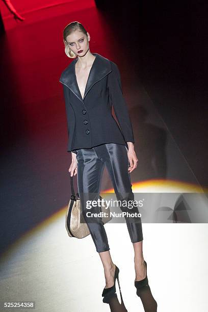 Model walks the runway at the Hannibal Laguna show during the Mercedes-Benz Madrid Fashion Week Autumn/Winter 2016/2017 at Ifema on February 19, 2016...