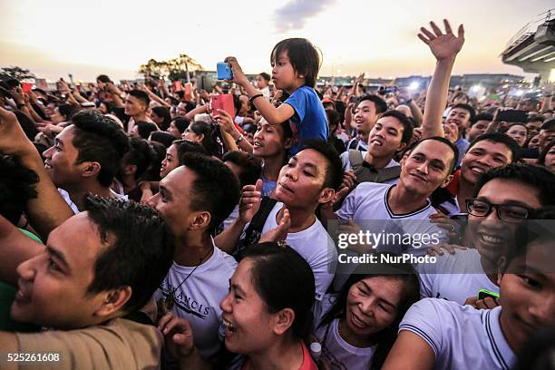 People wait for the arrival of Pope in Manila, Philippines on Thursday, January 15, 2015. Pope Francis arrived in the Philippines on January 15 for a...