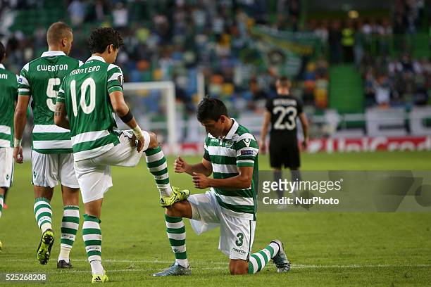Sporting's forward Fredy Montero celebrates after scoring a goal with Sporting's defender Jonathan Silva during the UEFA Europa League Group H...