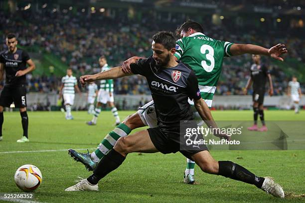 Sknderbeu's defender Kristi Vangjeli vies with Sporting's defender Jonathan Silva during the UEFA Europa League Group H football match between...