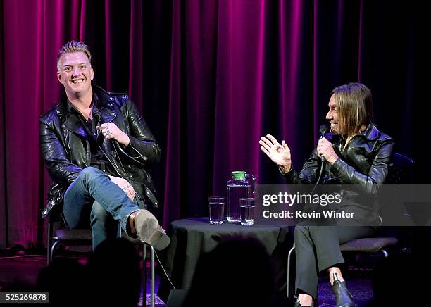 Musician Josh Homme and singer Iggy Pop speak onstage at the Grammy Museum on April 27, 2016 in Los Angeles, California.