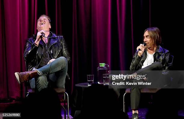 Musician Josh Homme and singer Iggy Pop speak onstage at the Grammy Museum on April 27, 2016 in Los Angeles, California.