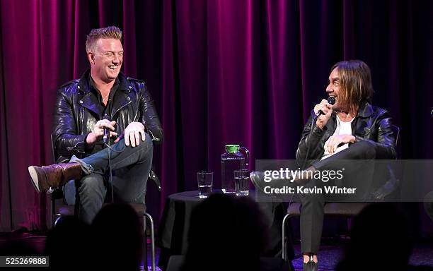 Musician Josh Homme and singer Iggy Pop speak onstage at the Grammy Museum on April 27, 2016 in Los Angeles, California.