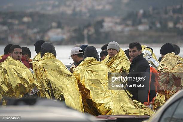 Group of refugees at Mitilini harbour after the volunteers rescue boat saved over 20 refugees this afternoon. Mitilini, Lesvos Island, Greece. On...