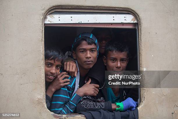 Bangladeshi Muslim devotees board trains after attending the Akheri Munajat concluding prayers on the third day of Biswa Ijtema, the second largest...