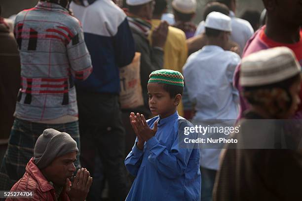 Bangladeshi Muslim devotees board trains after attending the Akheri Munajat concluding prayers on the third day of Biswa Ijtema, the second largest...