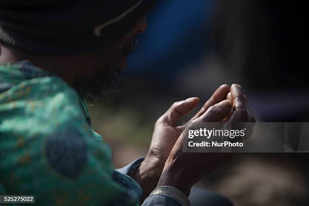 Bangladeshi Muslim devotees board trains after attending the Akheri Munajat concluding prayers on the third day of Biswa Ijtema, the second largest...