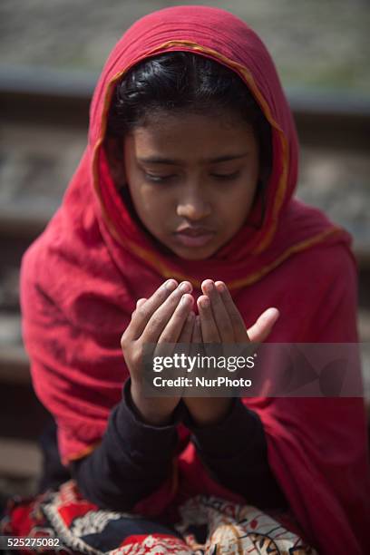 Bangladeshi Muslim devotees board trains after attending the Akheri Munajat concluding prayers on the third day of Biswa Ijtema, the second largest...