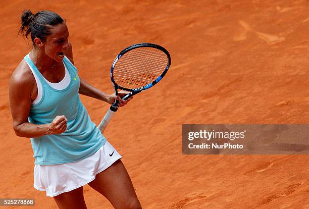 Italian tennis player Roberta Vinci celebrates after winning point during the match against French tennis player Aliz�� Cornet at the Madrid WTA...