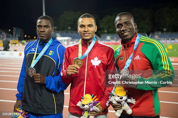Men's 100 meter dash, Ramon Gittens-Barbados-Silver medal, Andre Degrasse-Canada-gold medal, and Antoine Adams-Brazil-bronze medal, during athletics...