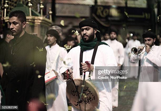 Bahrain , Manama - Shia'a muslims taking a part in the 8th of Muharram which holds the death of AlQassim , AlQassim was the son of the Imam, Hasan...