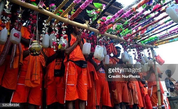 Indian hindu devotees prepare for Kanwar yatra as they worship before startting this sacred Yatra, on the sacred month of Shravan at Daraganj Ghat in...