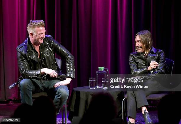 Musician Josh Homme and singer Iggy Pop speak onstage at the Grammy Museum on April 27, 2016 in Los Angeles, California.