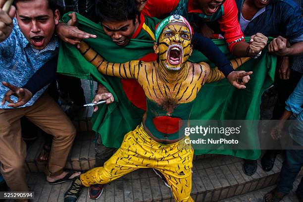 Bangladeshi people are celebrating the victory of Bangladesh Cricket Team at TSC, Dhaka, Bangladesh on 18 February, 2015. Bangladeshi Cricket Team...