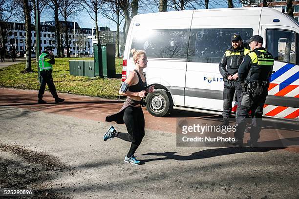 Runner with bare arms is seen on 18th February 2015 in The Hague, Netherlands. Temperatures this winter have been significantly above the historic...