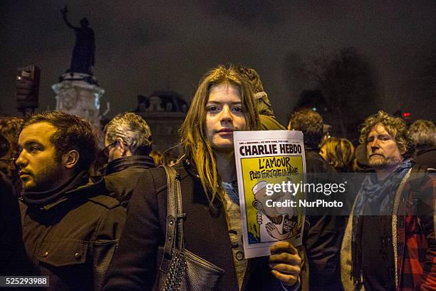 Thousand of people came tonight around 9 pm on January 7, 2015 at 'Place de la Republique' of Paris for a gathering after the deadly attack this...