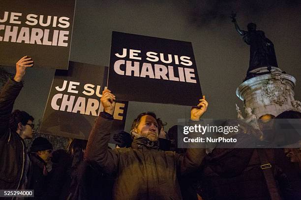 Thousand of people came tonight around 9 pm on January 7, 2015 at 'Place de la Republique' of Paris for a gathering after the deadly attack this...