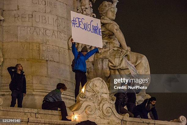 Thousand of people came tonight around 9 pm on January 7, 2015 at 'Place de la Republique' of Paris for a gathering after the deadly attack this...