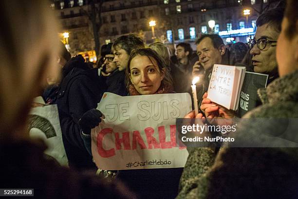 Thousand of people came tonight around 9 pm on January 7, 2015 at 'Place de la Republique' of Paris for a gathering after the deadly attack this...