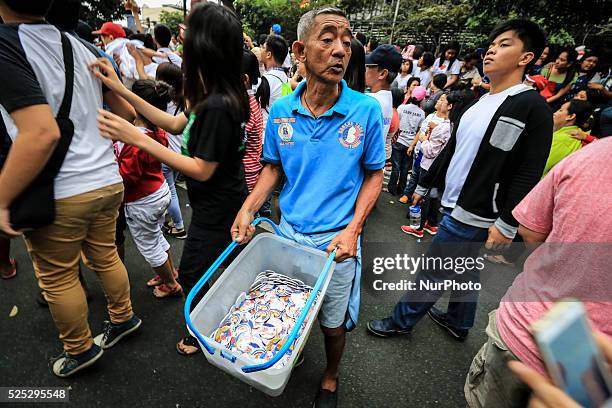 Huge crowds gathering in University of Santo Thomas in Espania Manila for the mass of the Pope Francis this morning on 18th January 2015.