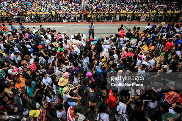 Huge crowds gathering in University of Santo Thomas in Espania Manila for the mass of the Pope Francis this morning on 18th January 2015.