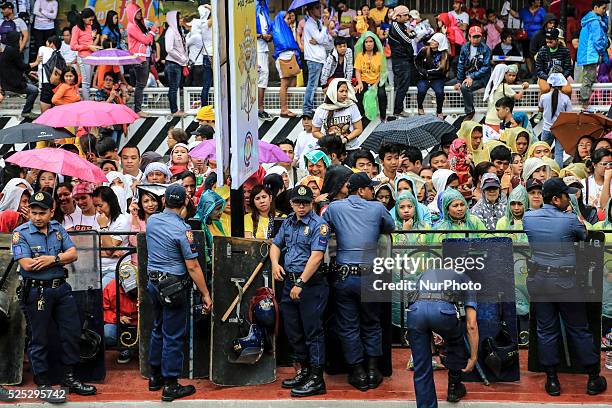 Huge crowds gathering in University of Santo Thomas in Espania Manila for the mass of the Pope Francis this morning on 18th January 2015.