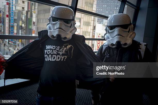 Fans of Star Wars wearing Star Wars costume go to the cinema to watch the new movie, Star Wars, The Force Awakens, in Shinjuku cinemas, Tokyo, on...