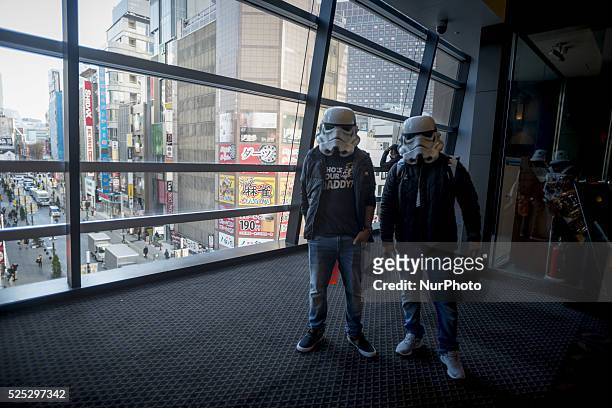 Fans of Star Wars wearing Star Wars costume go to the cinema to watch the new movie, Star Wars, The Force Awakens, in Shinjuku cinemas, Tokyo, on...