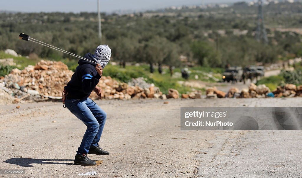 Clashes following a protest against closure of the village road, in Azzun