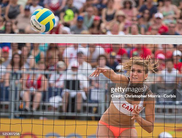 Taylor Pischke of Canada spikes the ball during Canada vs. Cuba in beach volleyball competition at the 2015 PanAm Games in Toronto.