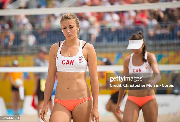 Taylor Pischke and Melissa Humana-Paredes of Canada, vs. Cuba in beach volleyball competition at the 2015 PanAm Games in Toronto.